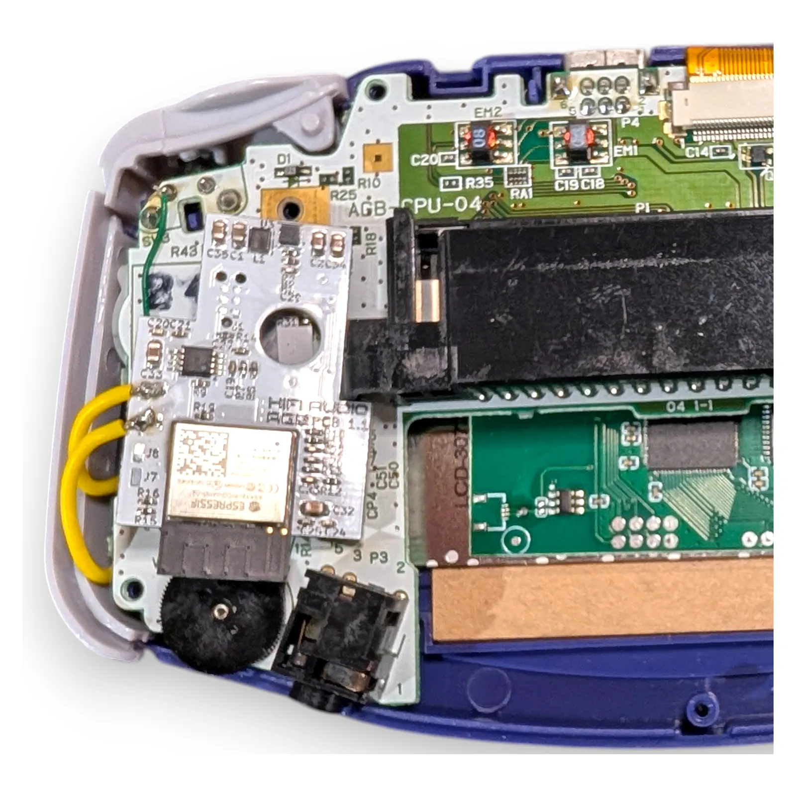 Installed in an AGB, over the mainboard. The yellow pair drives the console's own speaker.